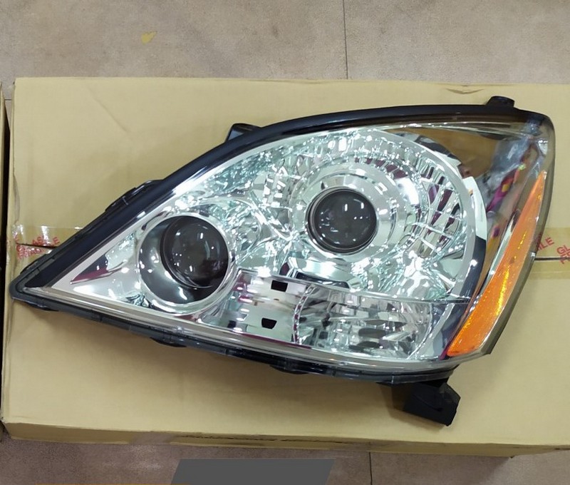 Đèn pha Toyota Fortuner 2007 RH (điện)