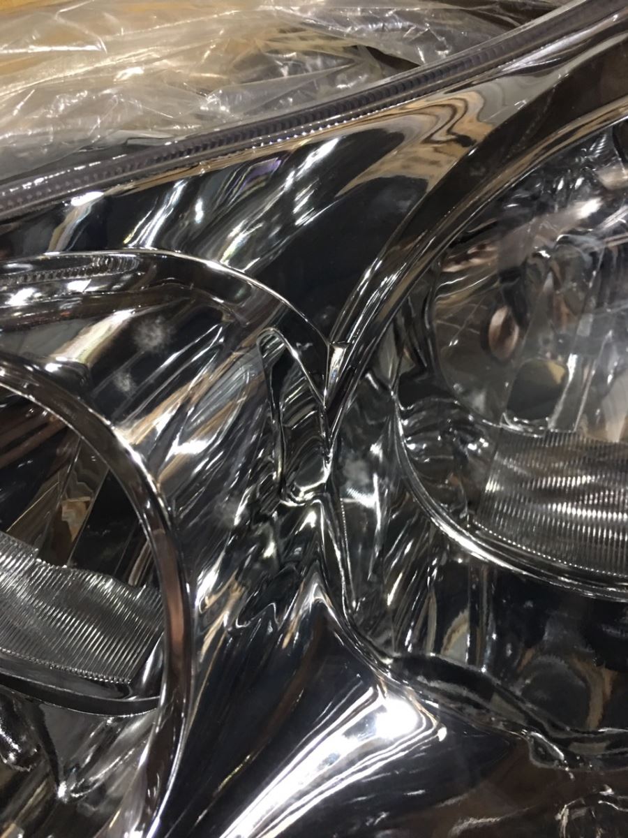 Đèn pha trái Toyota Altis 2003