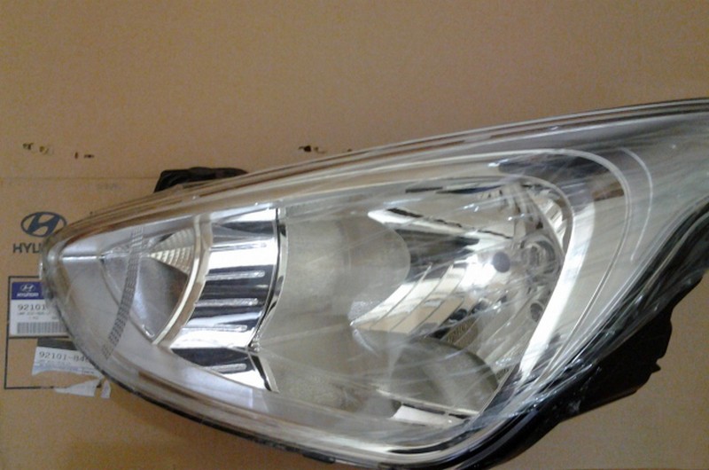 Đèn pha Hyundai i10 2014 LH (có dù, có lăng téc)