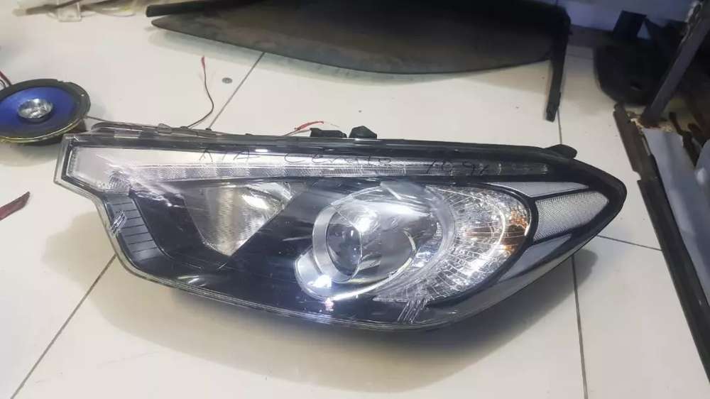 Đèn pha trái không led Kia K3